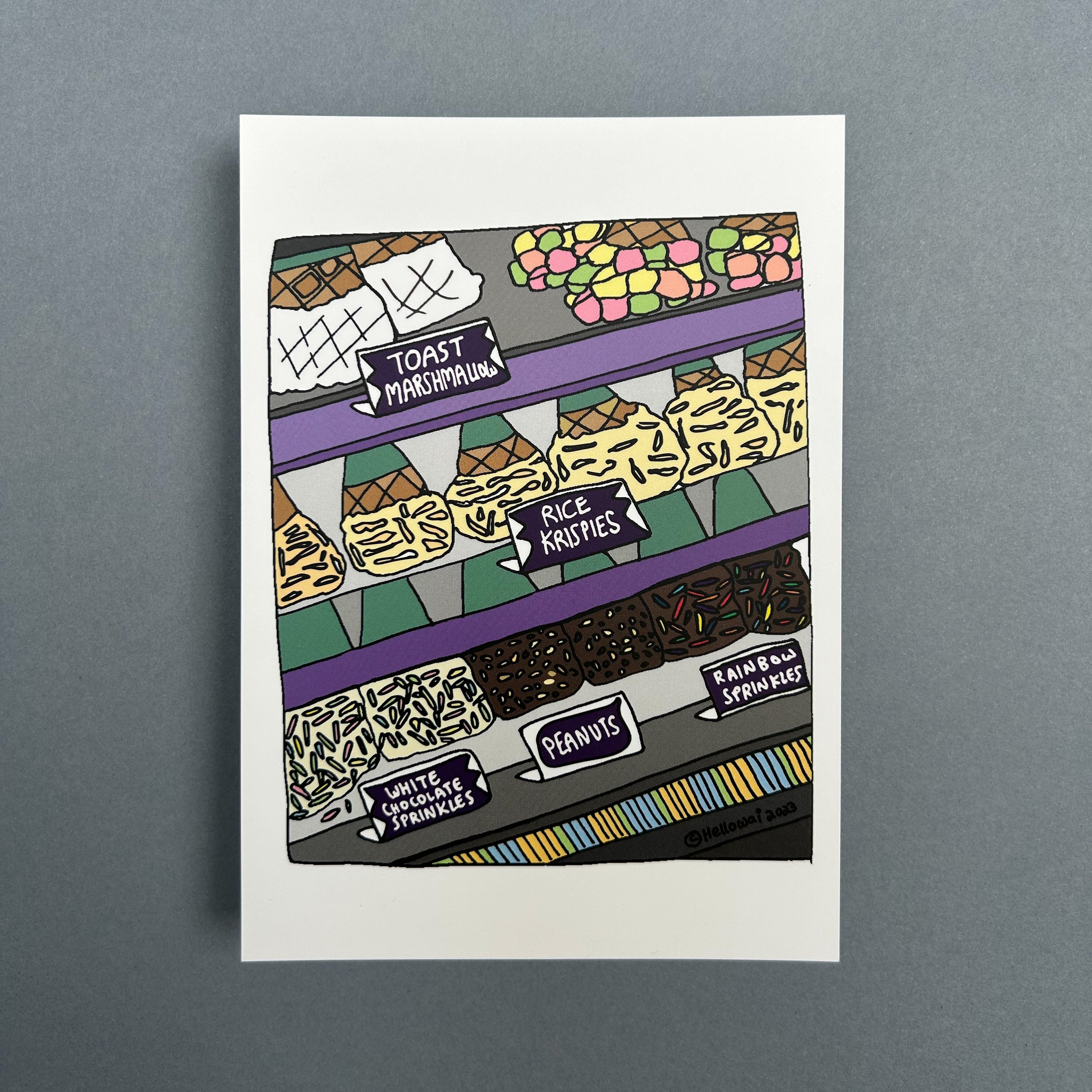 An A6 Hello Wai flat notecard with a colour illustration of an assortment of dipped waffle ice cream cones displayed upside down behind a glass counter, printed on white card.